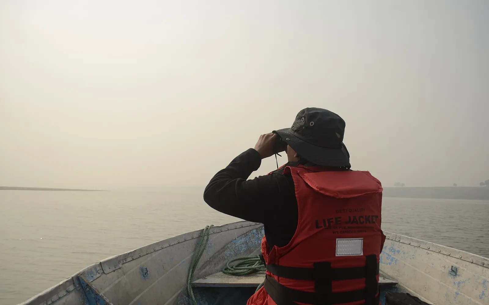 Birdwatchers on a boat on the Chambal River