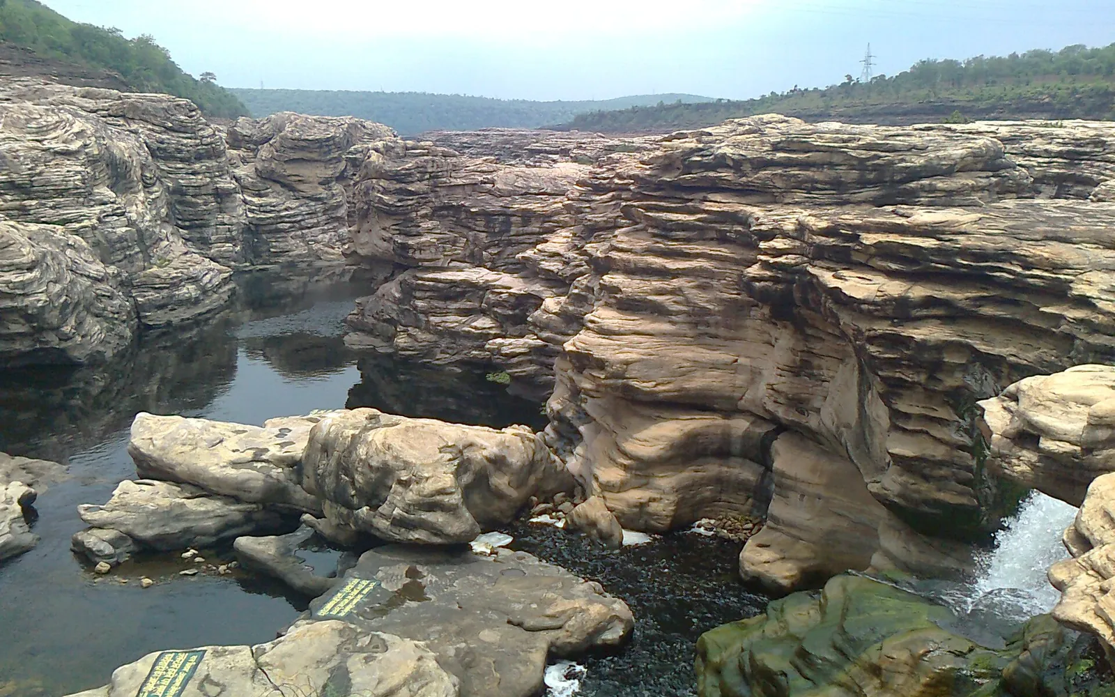 Water-carved sandstone ledges and pools of the Chambal gorge at Chuliya Falls near Rawatbhata